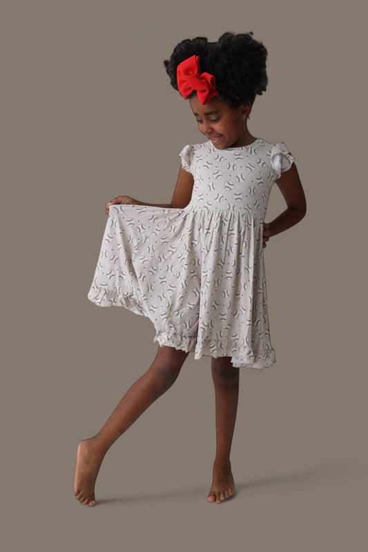 EXCLUSIVE SWING FOR THE STARS DREAM CAP SLEEVE RUFFLE DRESS